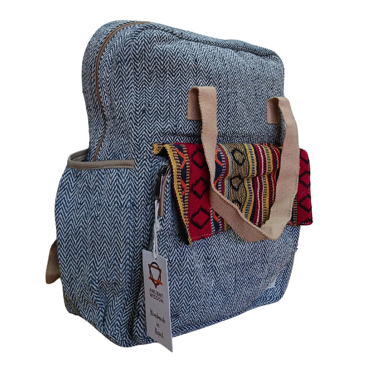 Hemp & Cotton Adventure Backpack – Annapurna Design, mochila azul de lona de cáñamo y algodón con detalle textil frontal y bolsillo lateral