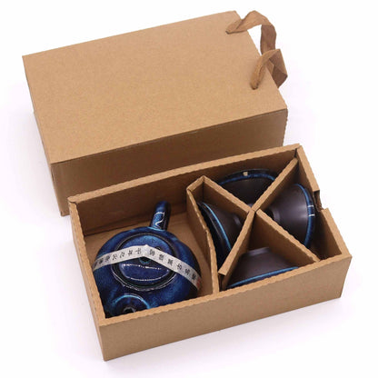 Herbal Blues Teapot Set – Pot & Four Cups in gift box packaging with blue ceramic teapot and four matching cups