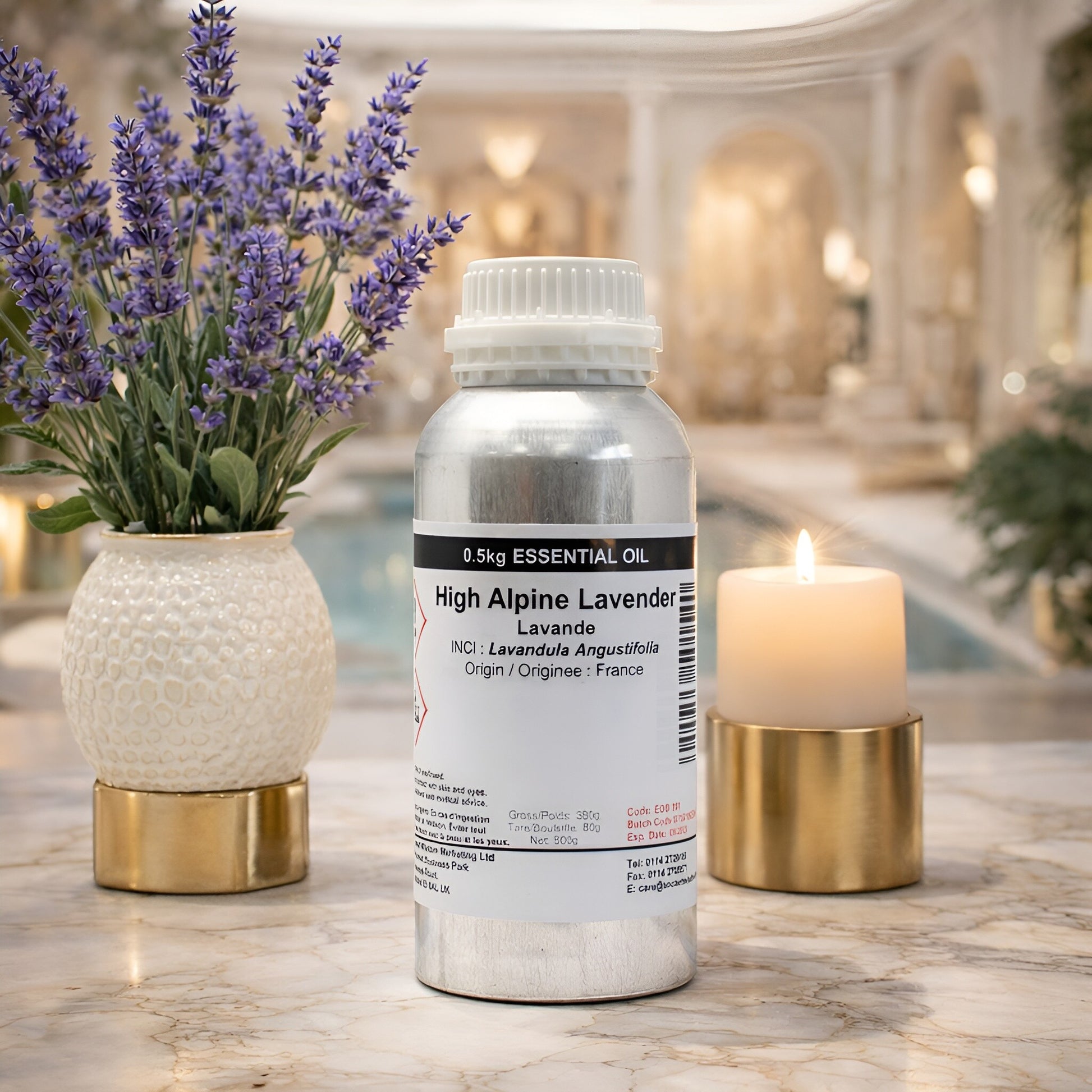Alt Tag: Lavender Essential Oil – 500G High Alpine bottle of High Alpine Lavender oil (Lavandula Angustifolia) from France on marble with lavender