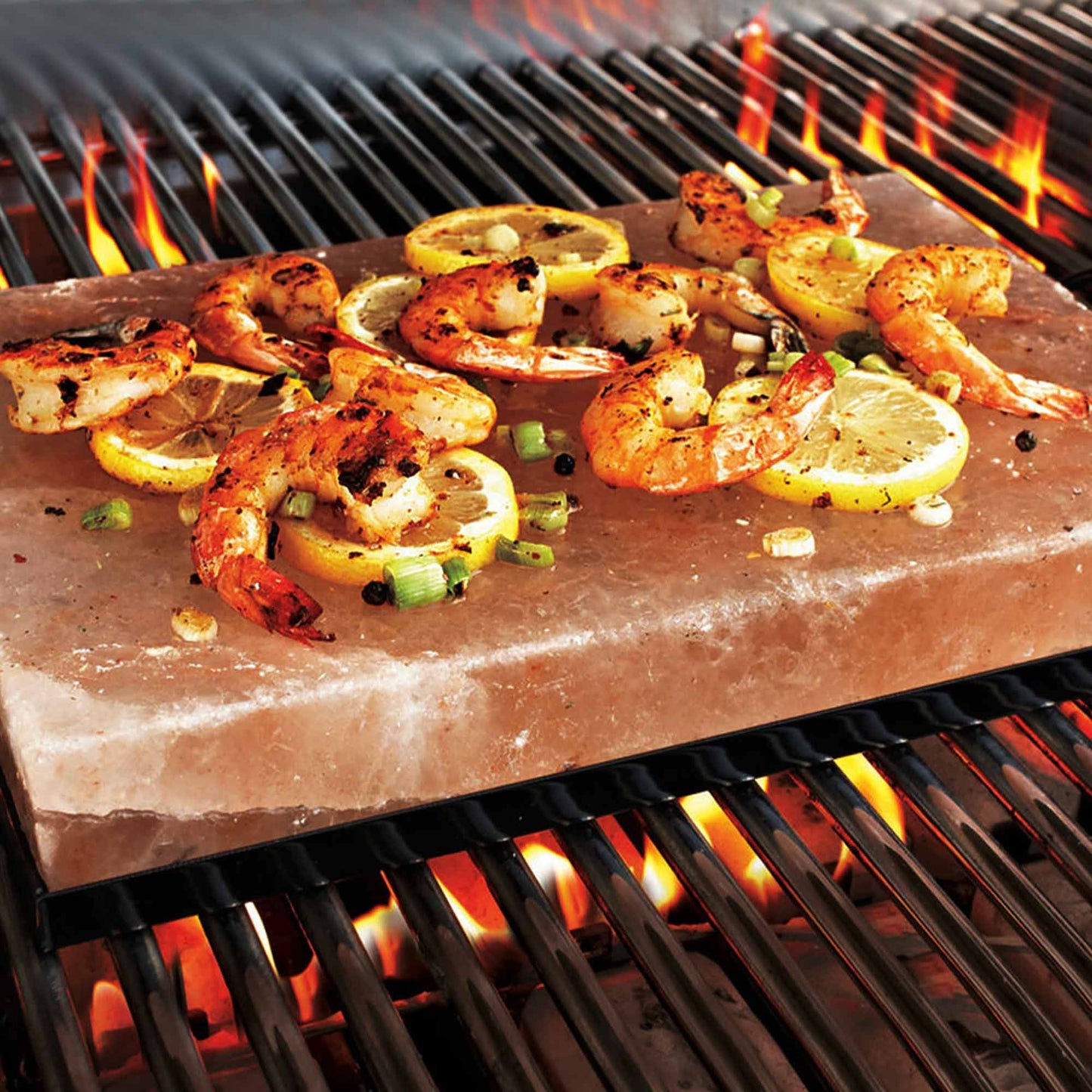 Alt Tag: Himalayan Salt BBQ Cooking Plate – 30 × 20 × 5 CM grilling shrimp with lemon slices on a barbecue grate