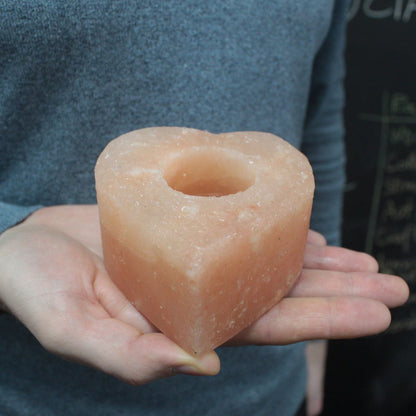 Alt Tag: Himalayan Heart Candle Holder – Medium heart-shaped Himalayan salt candle holder held in hands, medium size 10x12x9 cm