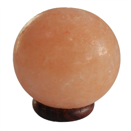 Himalayan Salt Lamp Ball – Large with Wooden Base, hand-carved salt sphere lamp on dark wooden base, warm amber glow