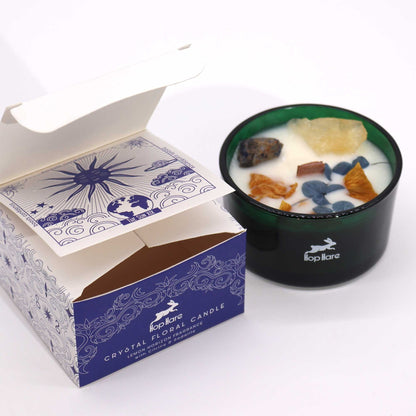 Alt Tag: Hope Hare Crystal Magic Flower Candle – The Sun i grön glasburk med dekorativa kristaller och blomvax, bredvid märkesförpackning