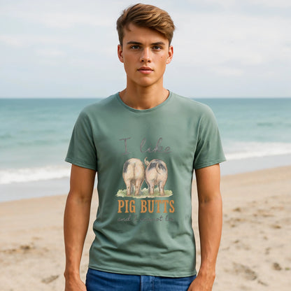 Alt Tag: I Like Pig Butts Vintage Premium Unisex T-Shirt worn by model on beach, vintage pig butts graphic tee front view