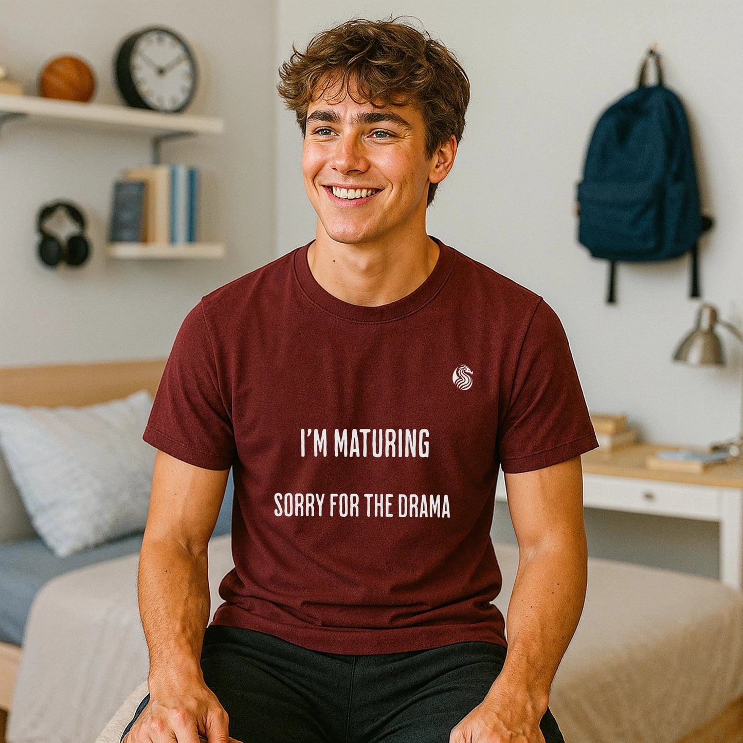 I’m Maturing Teen Sustainable Unisex Tee burgundy graphic t-shirt on teen model, front view with “I’M MATURING SORRY FOR THE DRAMA” text