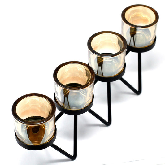 Alt Tag: Iron & Glass Votive Candle Holder – 4 Cup Zig Zag with four glass cups on black iron zig zag stand, votive candle centerpiece