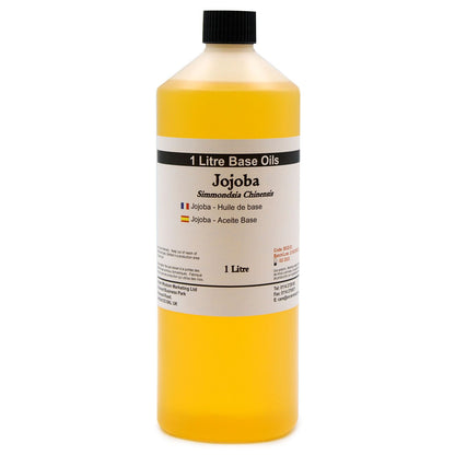 Alt Tag: Natural Peach Kernel Base Oil – 1 Litre 1 litro aceite base para cuidado de la piel, botella con tapa negra y etiqueta frontal