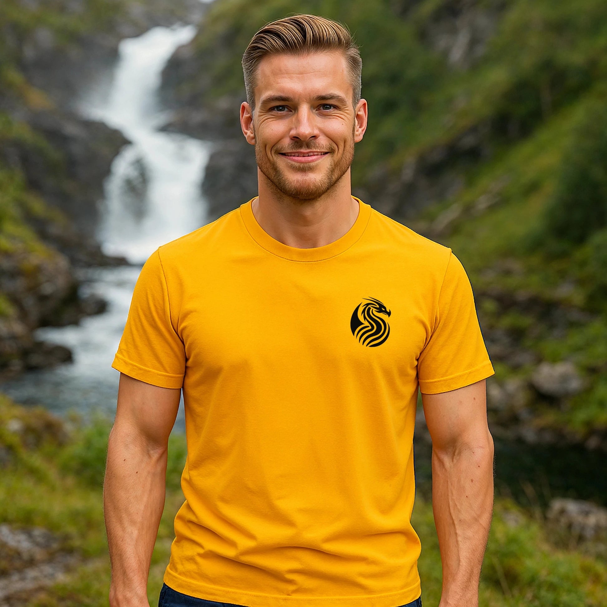 Alt Tag: Joven Dragon Premium Unisex T-Shirt amarilla con logo de dragón, modelo de pie al aire libre cerca de una cascada