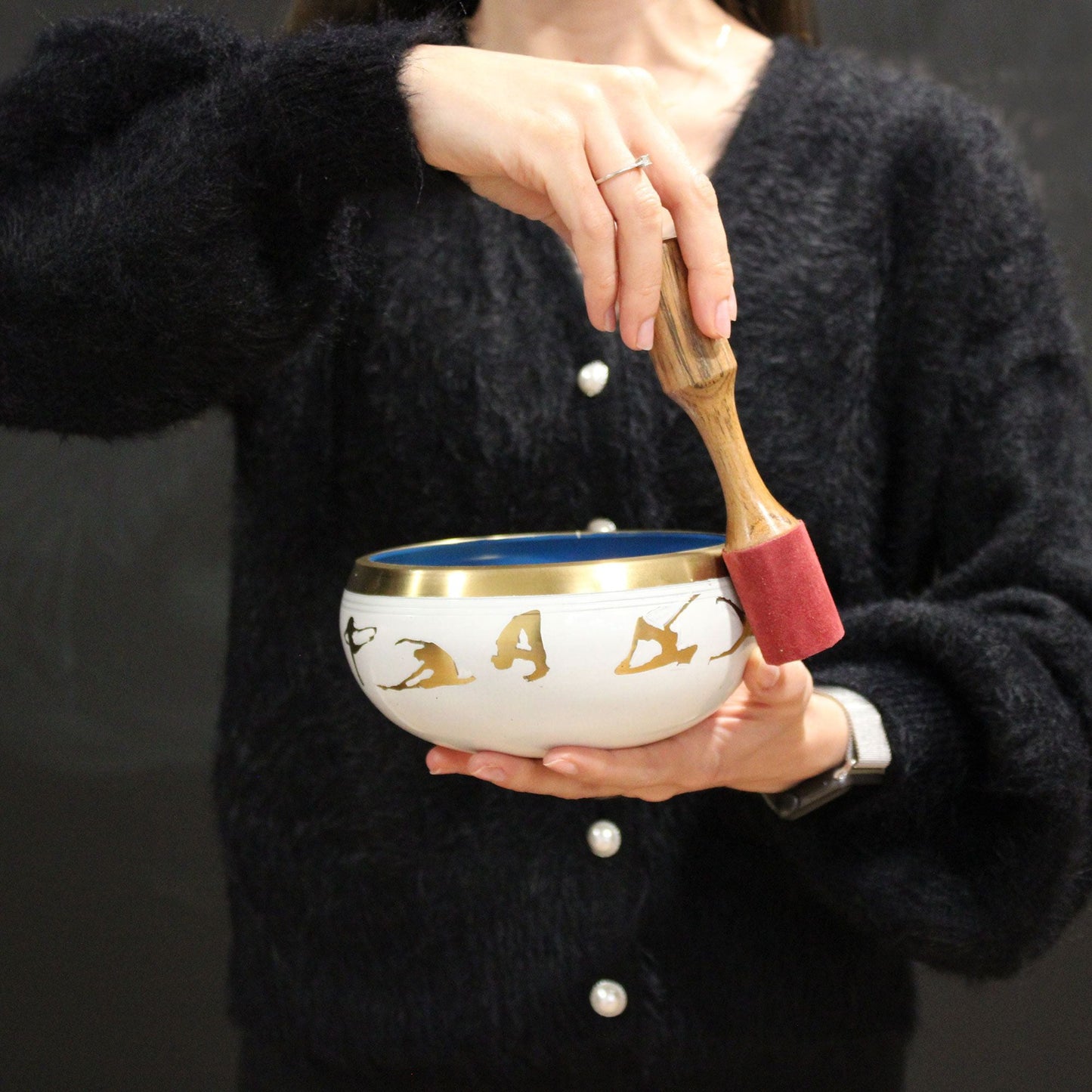 Large Moon Phase Singing Bowl Set – Black – 14 CM held in hands with wooden mallet, moon phase design singing bowl close-up