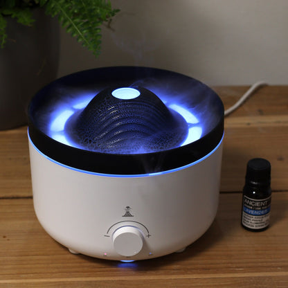 Alt Tag: Large Volcano Effect Aroma Diffuser (Plug) – Two Colours with blue LED volcano mist effect on wooden table