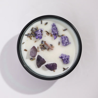 Alt Tag: Lavender Amethyst Crystal Candle – The Moon in black tin with white wax, amethyst crystals and dried lavender buds, top view
