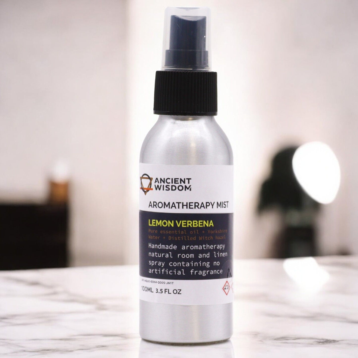 Alt Tag: Lemon Verbena Essential Oil Mist – 100ML spray bottle aromatherapy mist on countertop