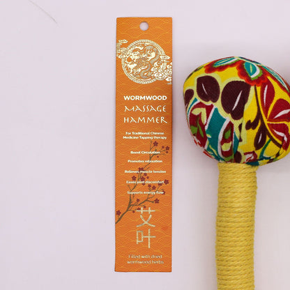 Lemon Wormwood Massage Hammer – Wooden Tool with colorful fabric head and wrapped wooden handle, shown with wormwood massage hammer box