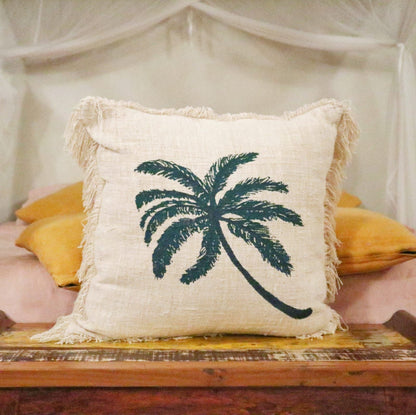 Alt Tag: Linen & Cotton Cushion – 60x60 CM Palm Tree Fringe cushion with palm tree print and fringe trim, styled on bed