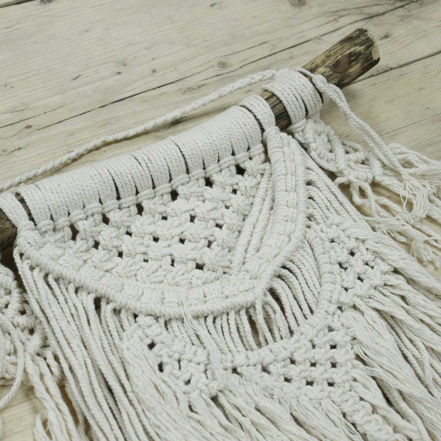 Alt Tag: Macramé Wall Hanging – Natural Abundance natural cotton wall decor with intricate knotwork, layered fringe and wooden dowel, neutral tones