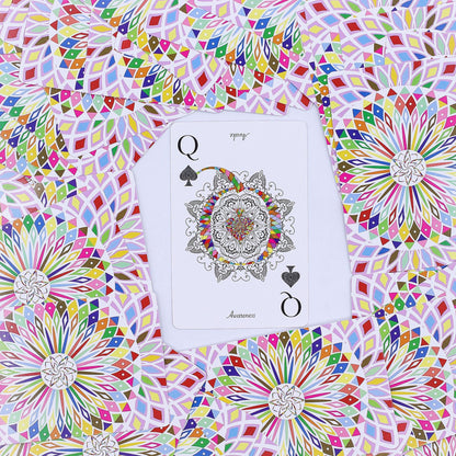 Alt Tag: Mandala Playing & Oracle Cards – Kaleidoscope Symmetry Queen of Spades card with colorful mandala design on patterned background