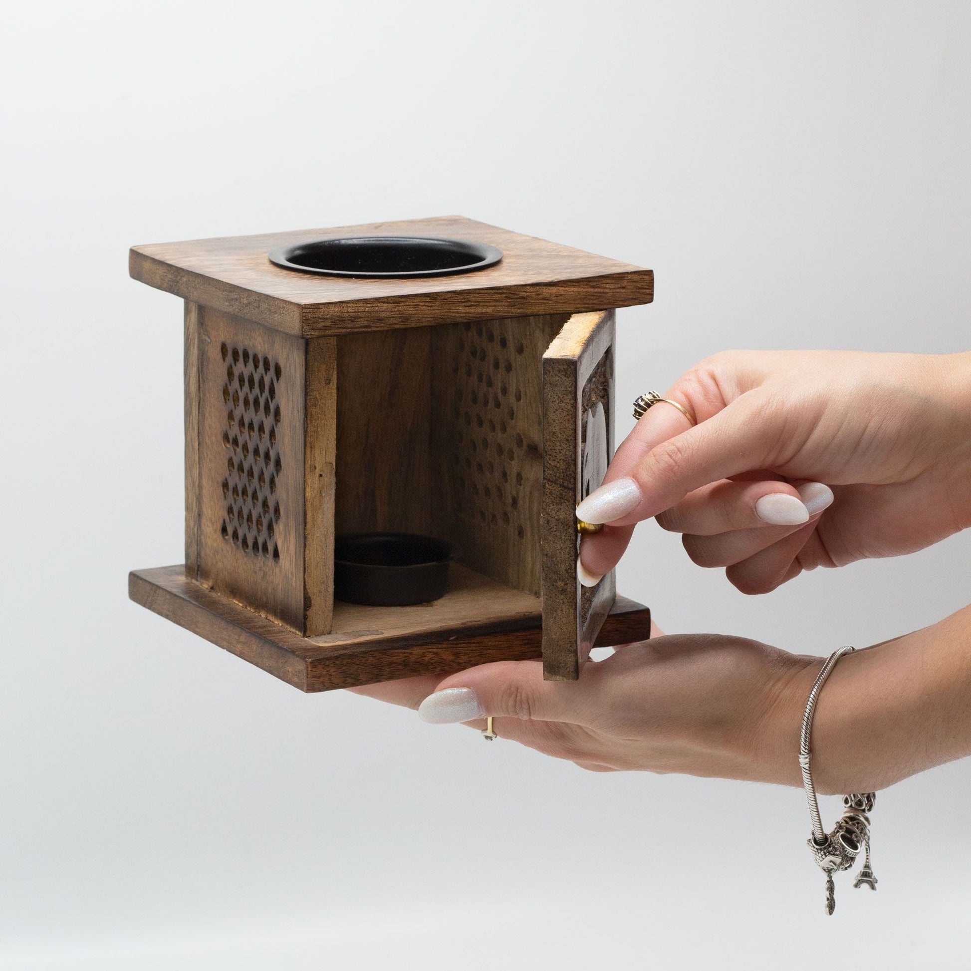 Alt Tag: Mango Wood Oil Burner – Tree of Life Design handheld mango wood oil burner with opening door and top dish