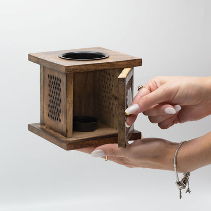 Alt Tag: Mango Wood Oil Burner – Tree of Life Design handheld mango wood oil burner with opening door and top dish