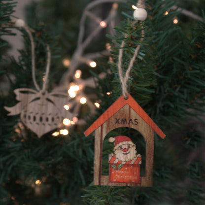 Alt Tag: MDF Christmas Wooden Santas – 7x7 CM (Pack of 2) wooden Santa ornament hanging on Christmas tree with lights