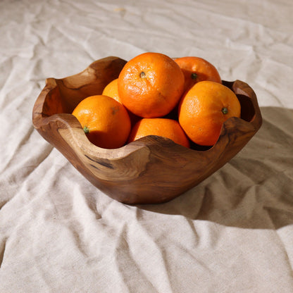 Medium Smooth Teakwood Fruit Bowl – 21 × 9 CM with oranges, hand-turned teakwood bowl showing natural grain and smooth finish
