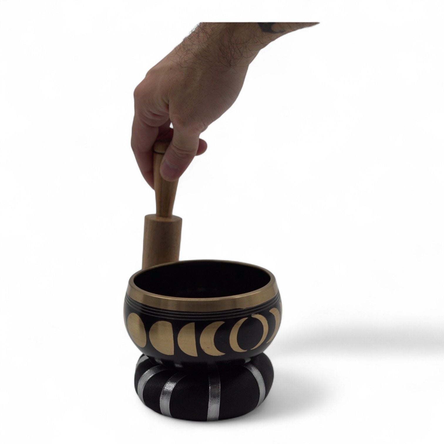 Alt Tag: Moon Phase Singing Bowl Set – Black 10.7 CM with gold moon phase design, matte black finish, hand holding wooden mallet