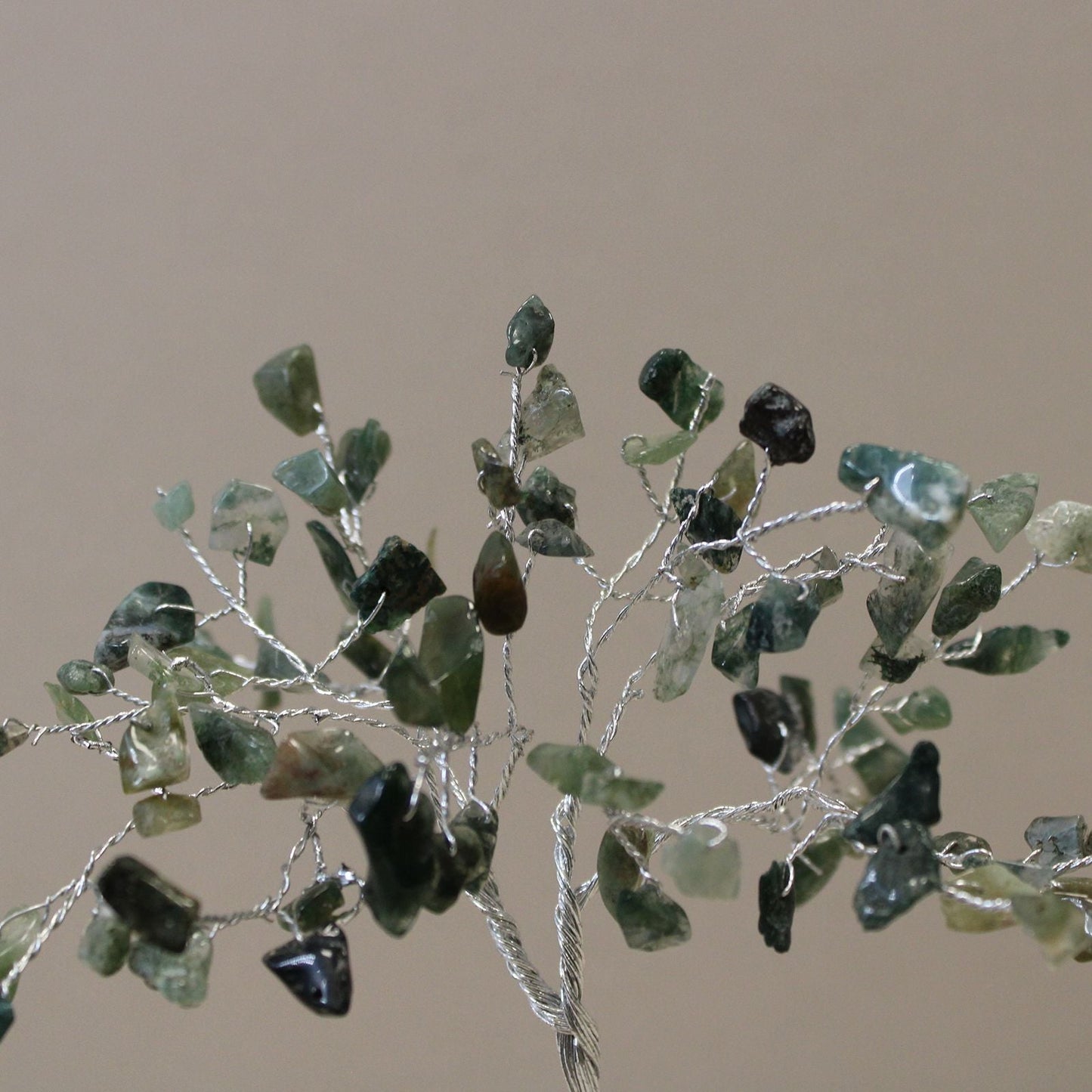 Alt Tag: Moss Agate Gemstone Tree – 80 Stones with green moss agate chips on silver wire branches, handcrafted decor close-up