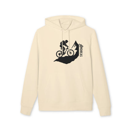 Mountain Bike Personalized Sustainable Unisex Hoodie color crema con gráfico de ciclista en montaña y nombre personalizado "ANDREA"