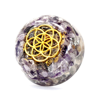 Alt Tag: Mystic Amethyst Orgonite Dome – 6.5x3 CM with amethyst chips and gold flower of life symbol, clear resin desk decor