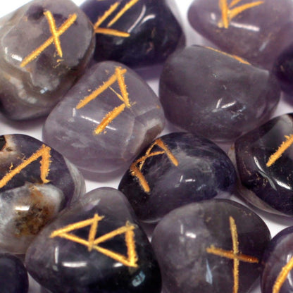 Alt Tag: Mystical Amethyst Rune Set – Indian Craft close-up of engraved amethyst stones with gold rune symbols