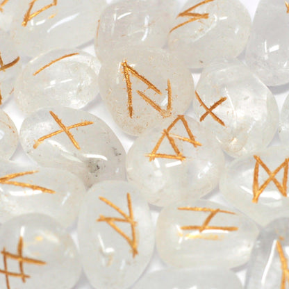Alt Tag: Mystical Indian Rune Stone Set – Crystal Pouch, close-up of clear rune stones with gold symbols, 1.5 cm each