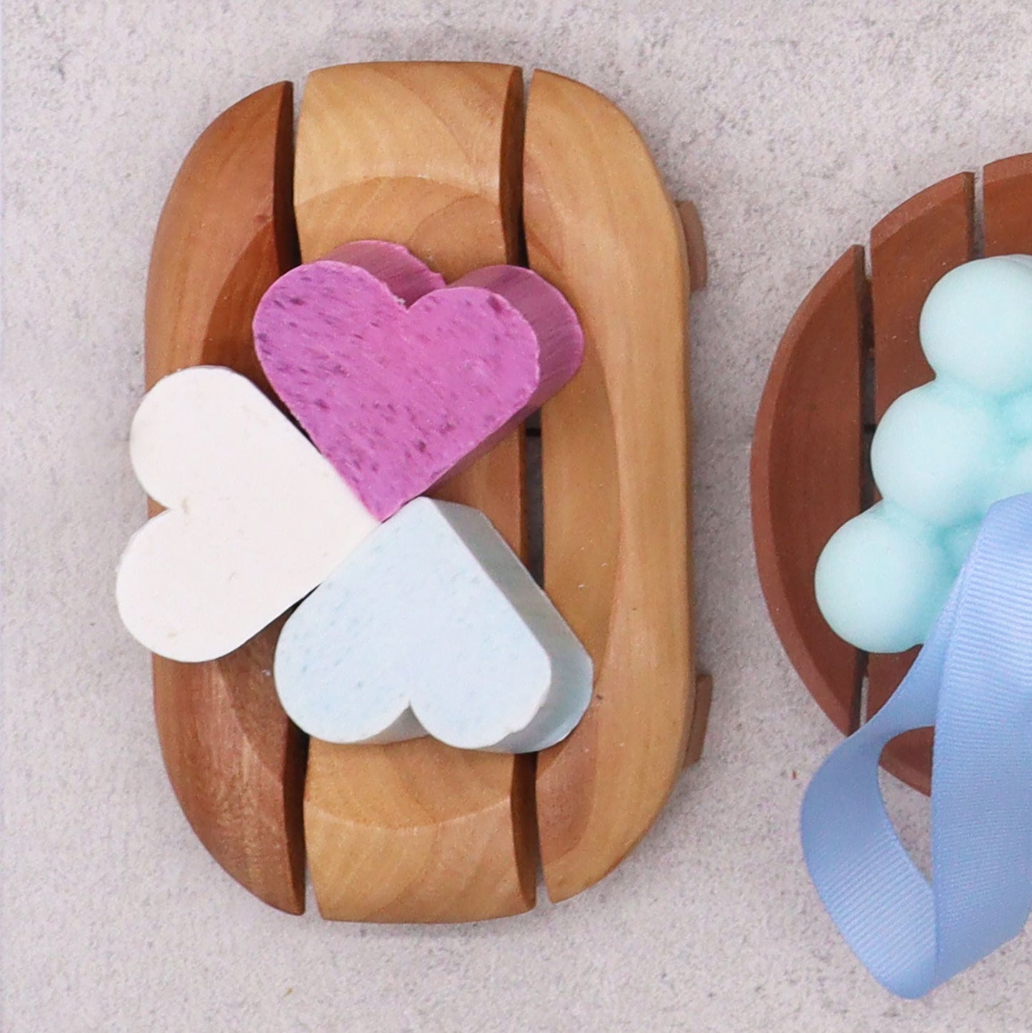 Alt Tag: Naseberry Wood Soap Dish – Oval in Rectangle with slatted oval-in-rectangle design holding heart-shaped soaps