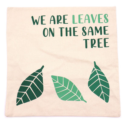 Natural Cotton Cushion Cover – We Are Leaves, 45x45 CM with “WE ARE LEAVES” text and green leaf print on natural cotton