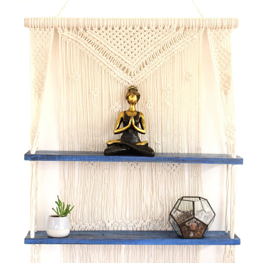 Alt Tag: Natural Cotton Macrame Shelf – Blue with natural cotton macrame wall hanging, blue wooden shelves, and decor items