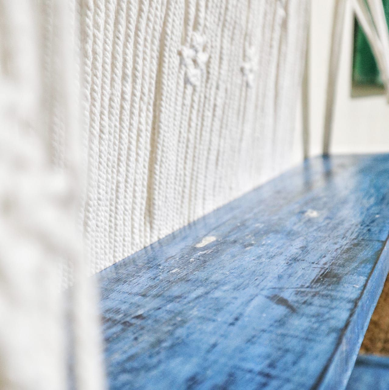 Natural Cotton Macrame Shelf – Blue close-up of blue wooden shelf board with natural cotton macrame hanging detail