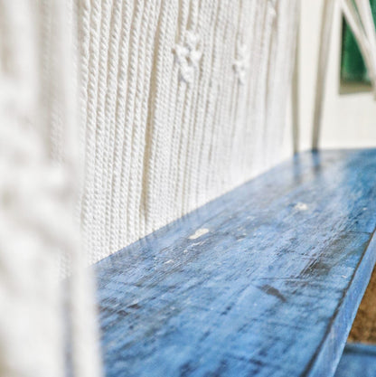 Natural Cotton Macrame Shelf – Blue close-up of blue wooden shelf board with natural cotton macrame hanging detail
