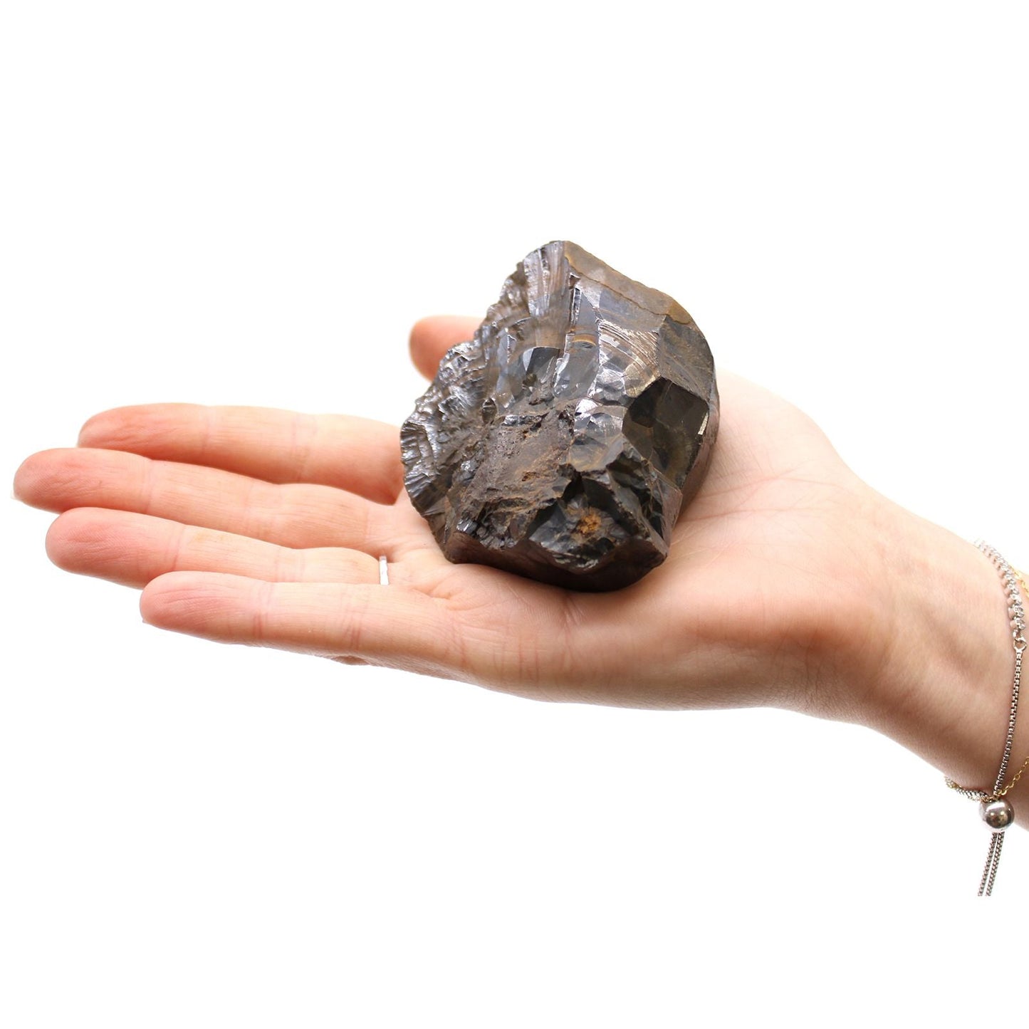 Alt Tag: Natural Hematite Mineral Specimens – Approx 20 Pieces, metallic black hematite rough stone specimen held in hand on white background