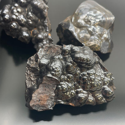 Alt Tag: Natural Hematite Mineral Specimens – Approx 20 Pieces with metallic black sheen and red streak, natural mineral rocks close-up