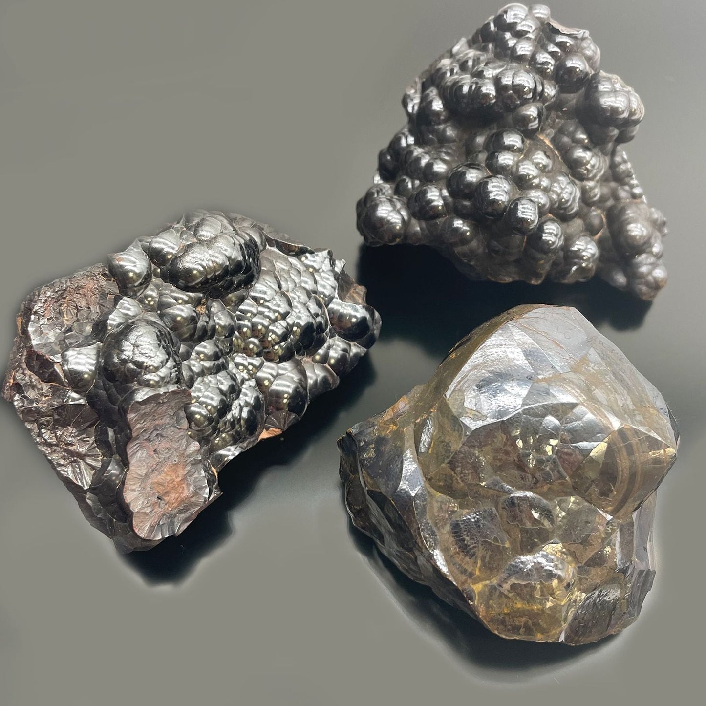 Natural Hematite Mineral Specimens – Approx 20 Pieces, metallic black hematite rocks with shiny luster and natural textures, close-up