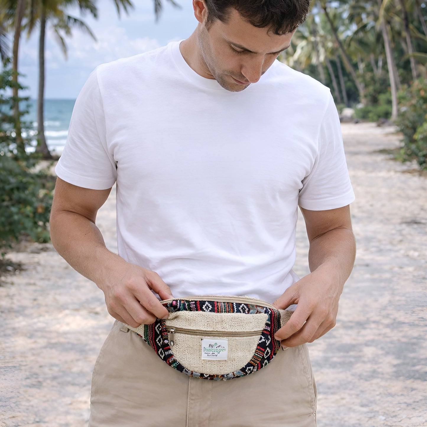 Natural Hemp & Cotton Bum Bag worn as waist pack on beach path, hemp-cotton blend fanny pack with patterned strap and front zip pocket