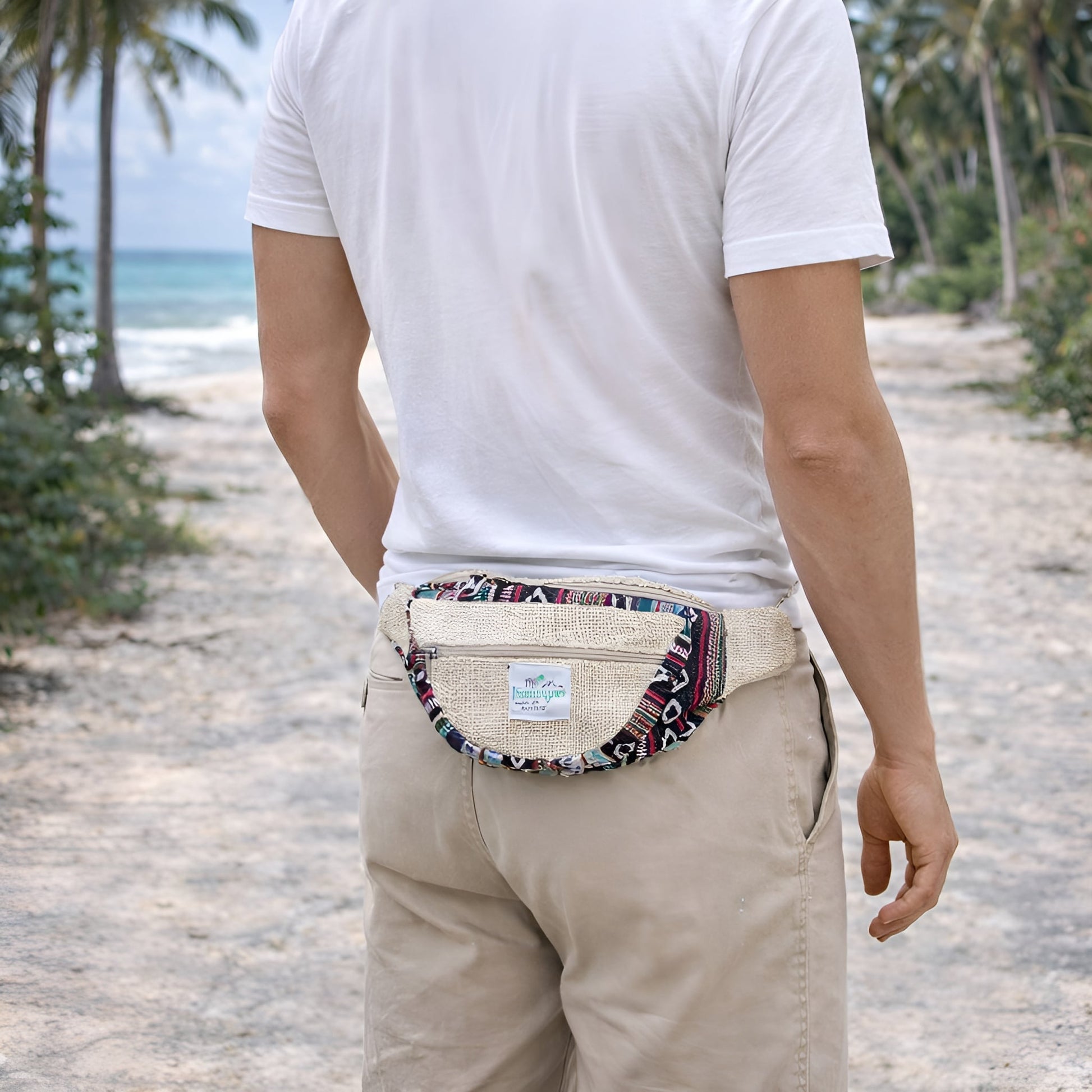 Alt Tag: Natural Hemp & Cotton Bum Bag worn as waist bag on beach path, compact 25x15x3 cm hemp-cotton blend with zip closure