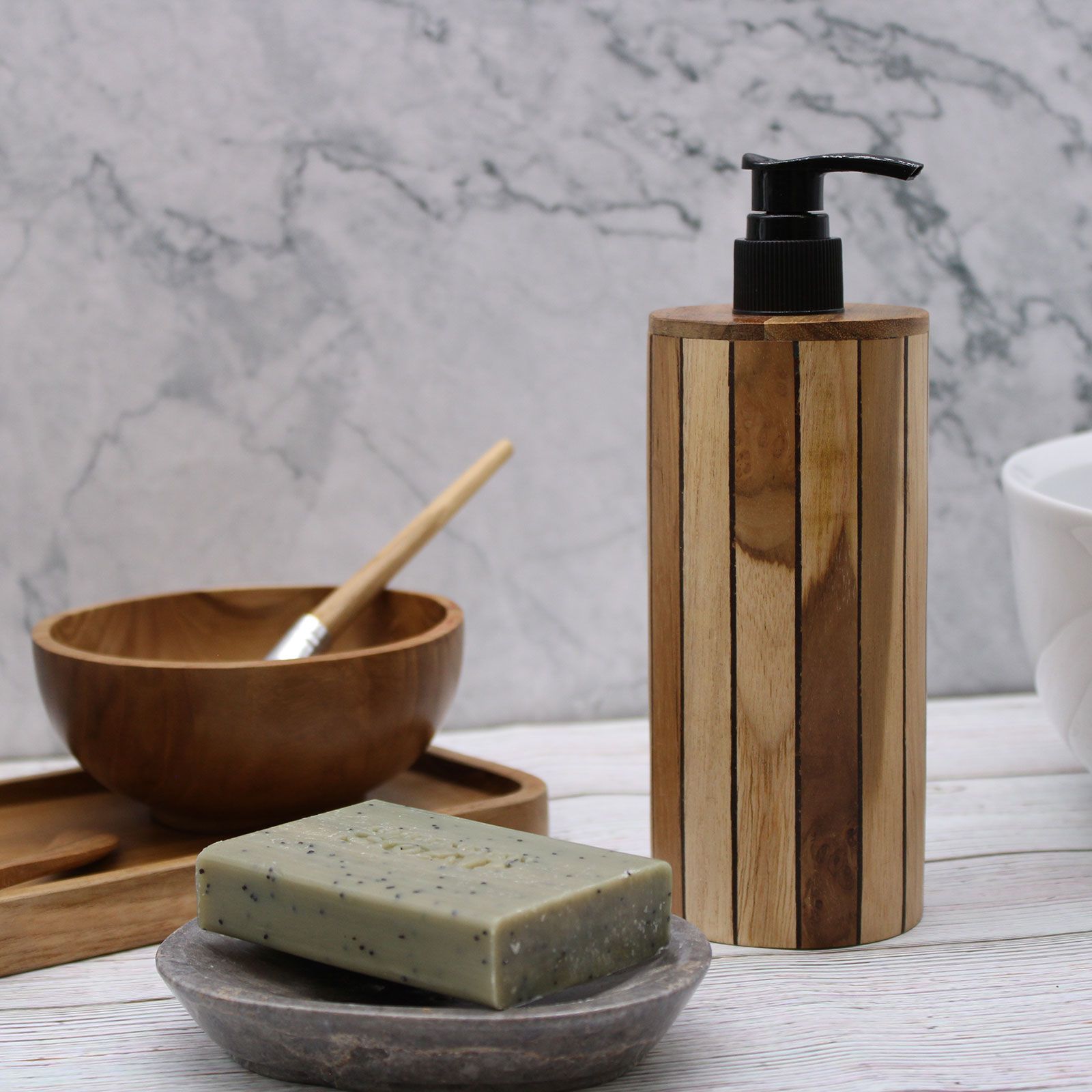 Natural Teakwood Soap Dispenser – Round 20x8x9 CM on bathroom sink countertop with soap bar and wooden bowl