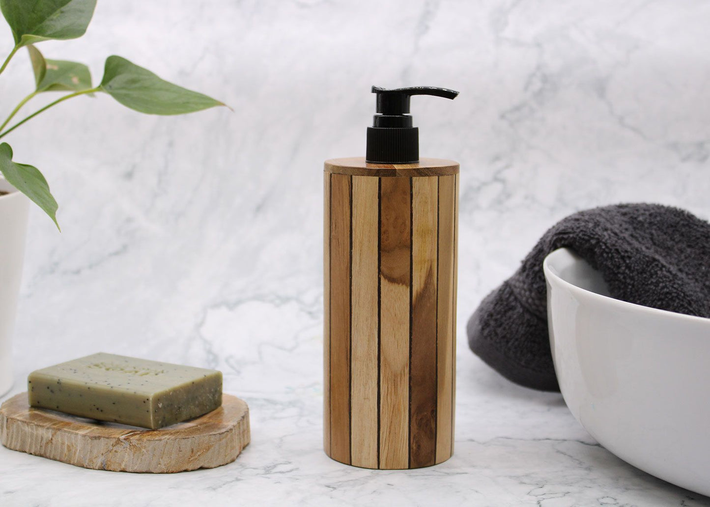 Natural Teakwood Soap Dispenser – Round 20x8x9 CM teak wood soap pump bottle on bathroom sink with soap bar, towel and bowl