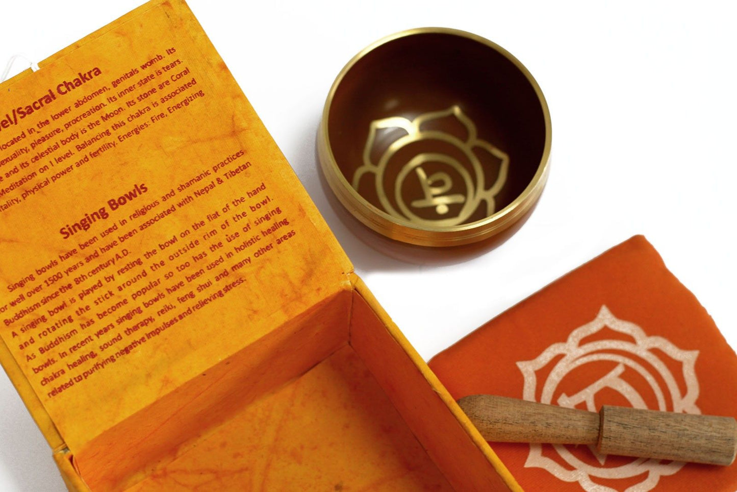Navel (Sacral) Chakra Singing Bowl – Approx. Frequency 823 Hz, metal bowl with mallet and orange box, Svadhisthana symbol