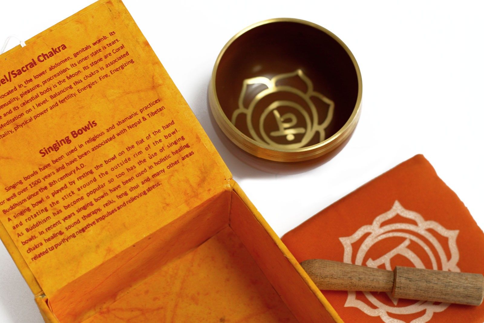 Navel (Sacral) Chakra Singing Bowl – Approx. Frequency 823 Hz, metal bowl with mallet and orange box, Svadhisthana symbol
