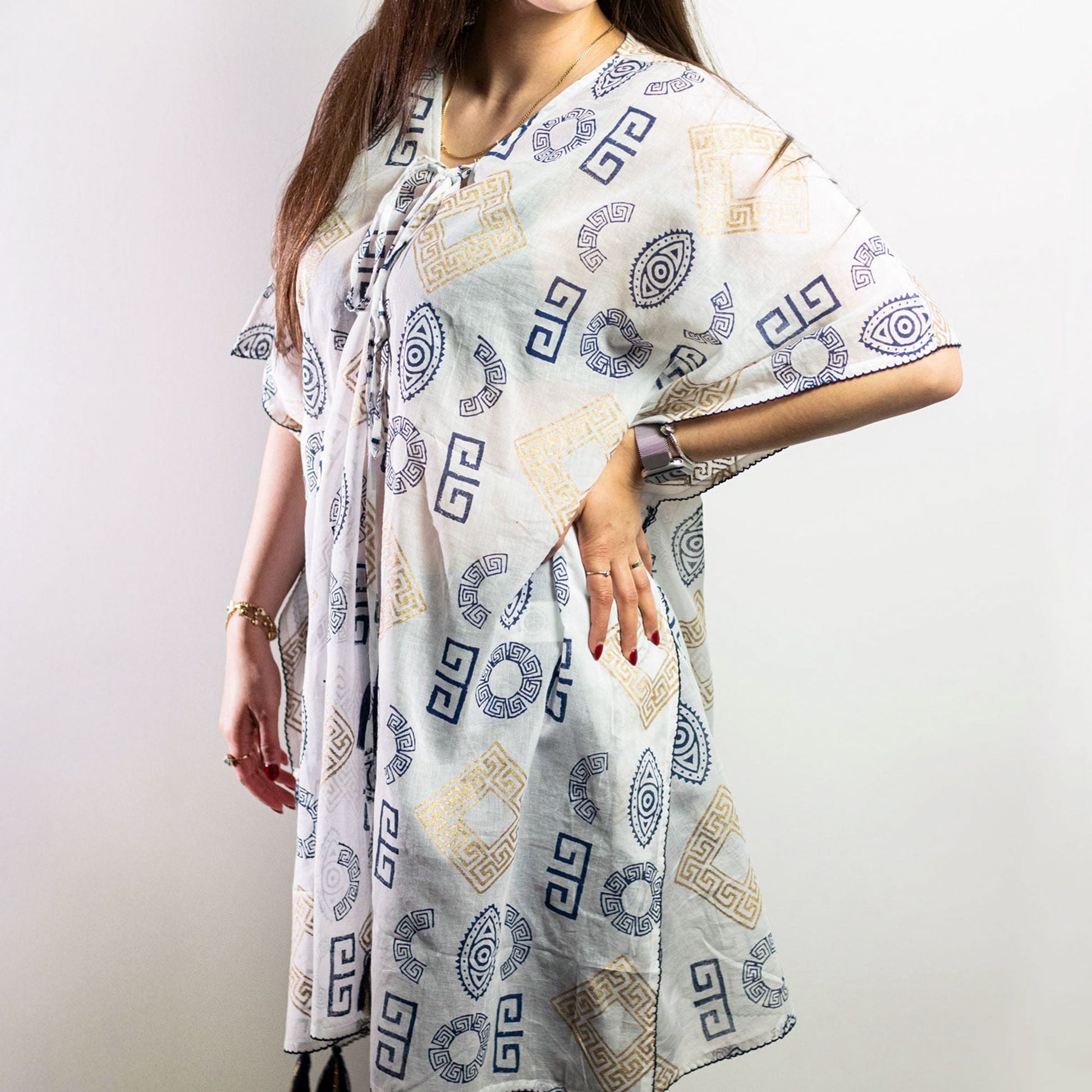 Nomad Sari Kaftan – Gold & Blue Greek Motif (Hand-Painted) flowy white kaftan with Greek motif print, relaxed silhouette