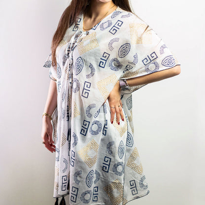 Nomad Sari Kaftan – Gold & Blue Greek Motif (Hand-Painted) flowy white kaftan with Greek motif print, relaxed silhouette