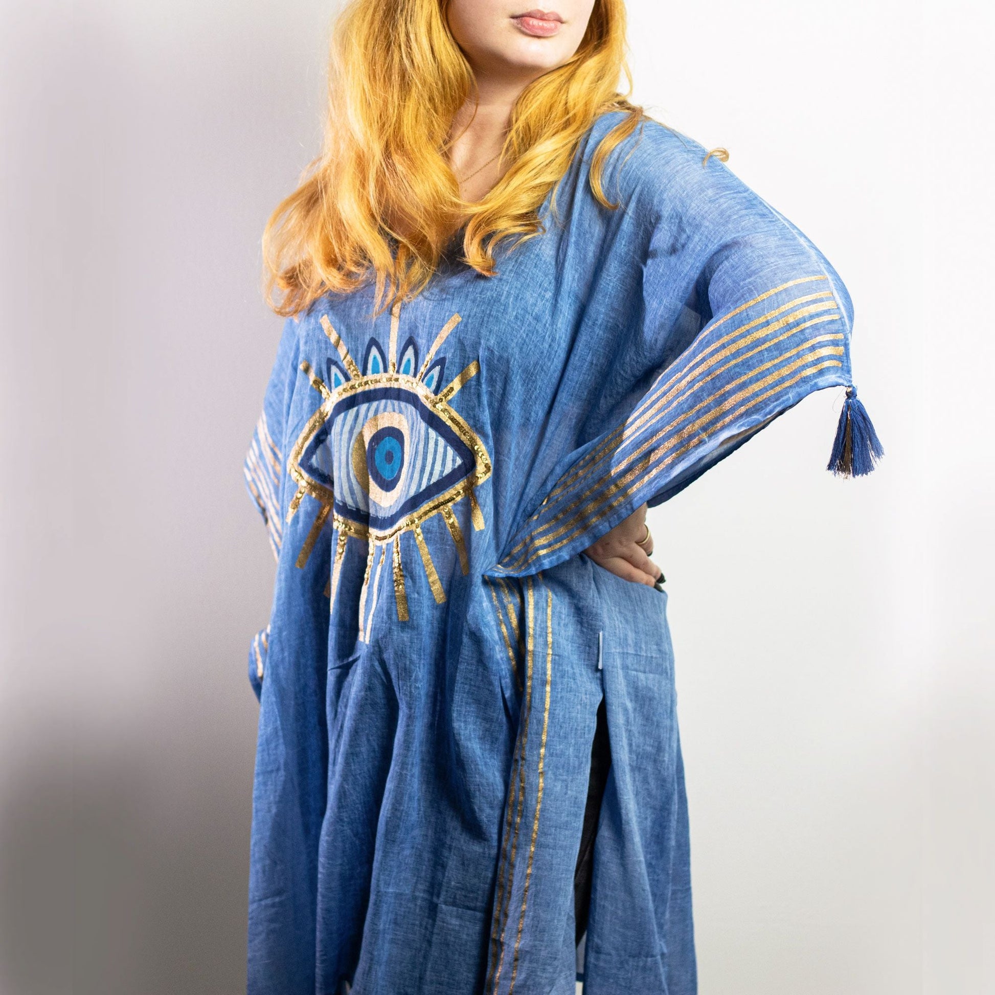 Nomad Sari Kaftan – Rich Blue & Gold Evil Eye Design (Hand-Painted) blue kaftan with gold evil eye motif, tassel sleeve