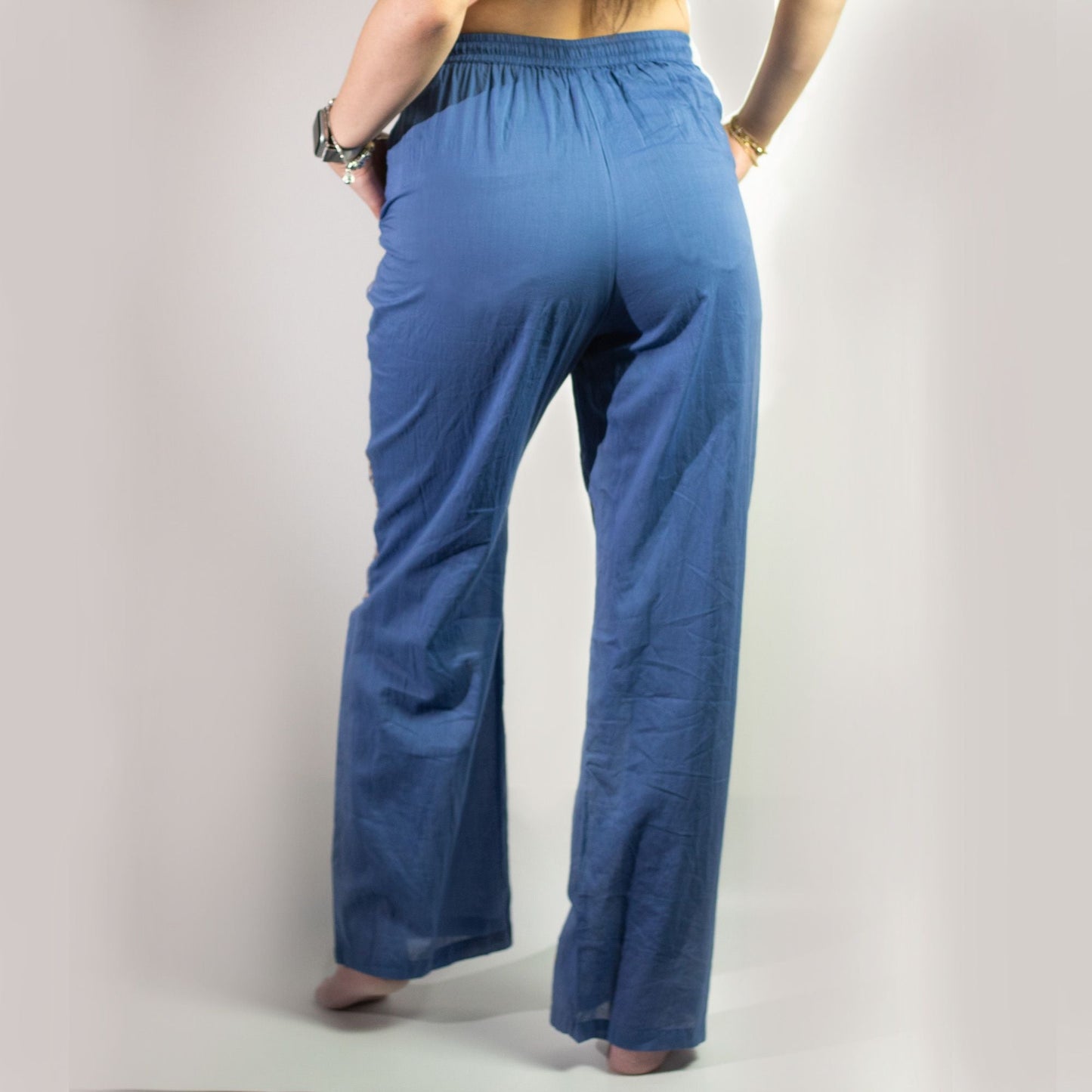 (L/XL) Nomad Sari On the Med Collection – Lounge Pants – Rich Blue & Gold Hand-Painted Evil Eye Design, back view rich blue pants