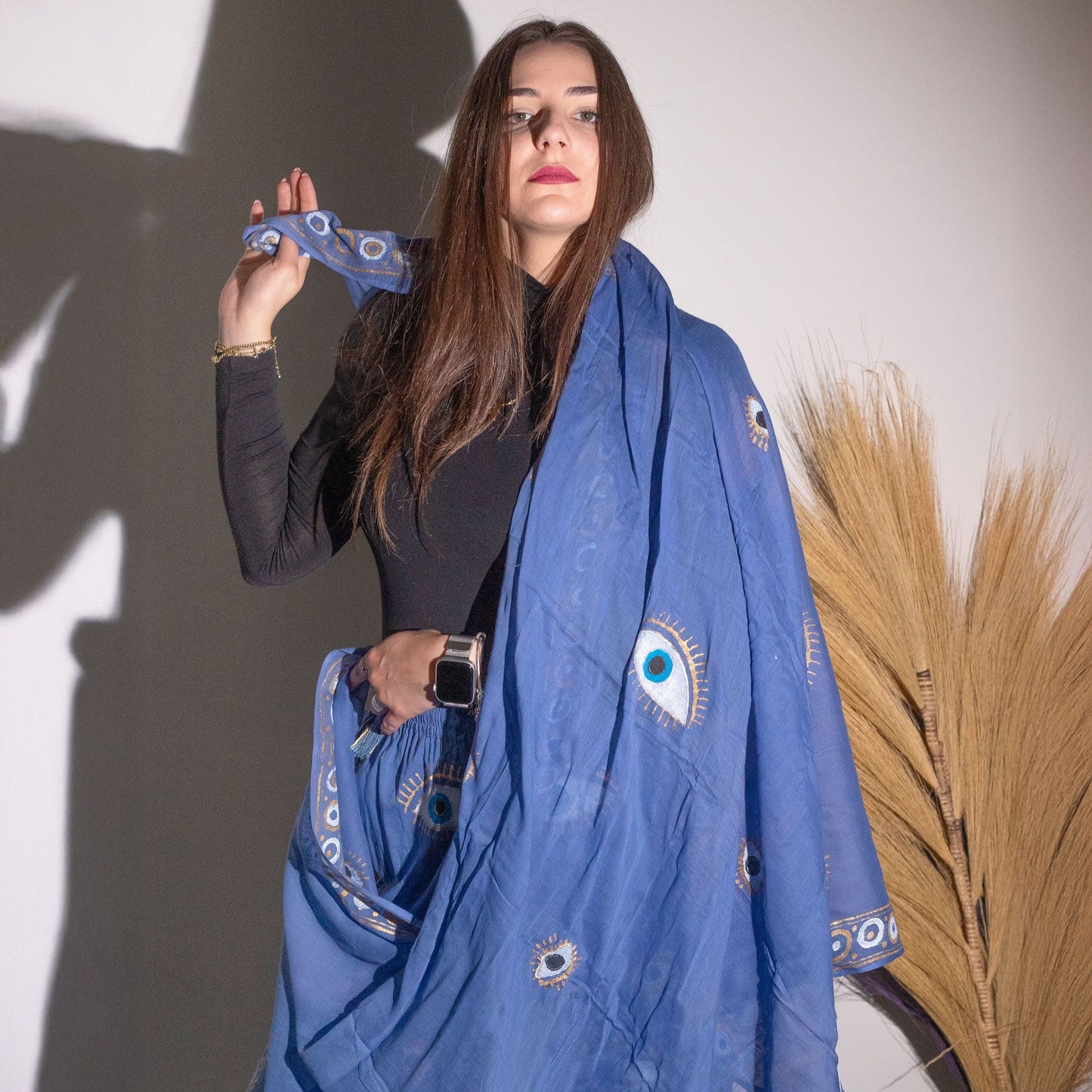 Nomad Sari Pario – Sea Blue & Gold Fish Design worn as a draped sea-blue pario with gold motifs, styled on a model