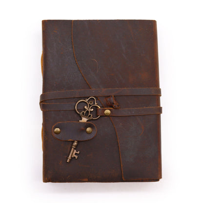 Oiled Leather Notebook – 200 Pages, 13x18CM brown oiled leather journal with wrap strap and vintage key charm, front view